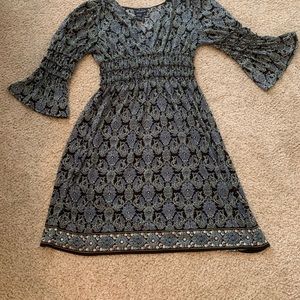 Black and turquoise bell sleeved dress